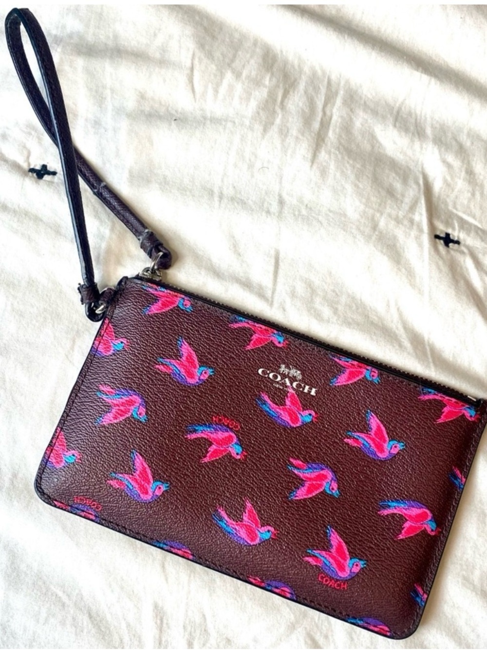 COACH Burgundy Wristlet with Pink & Blue Happy Bird Print